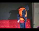 DESTINY wearing a sexy blue/red shiny nylon rain suit putting on a life jacket and posing (Video)