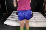 Watch Pia enjoying her blue shiny nylon Shorts