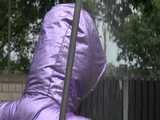 Watch Sandra taking a shower in her new purple shiny nylon down jacket 