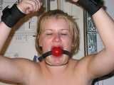 Dumb Blonde Slut is Tied and Stripped Naked in the Garage, Exposed in humiliating nude bondage.