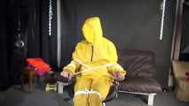 Sandra being tied and gagged on a hairdresser´s chair wearing sexy yellow shiny nylon rainwear being double hooded (Video)