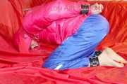 Sonja tied and gagged on a bar wearing a sexy blue shiny nylon rain pants and a pink down jacket (Pics)