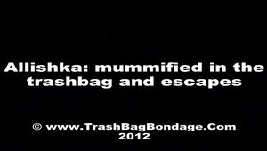 [From archive] Allishka - mummified staying into the trash bag and escapes