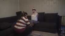 Elysa roped on couch 