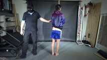 New Model Myxxxy bound in heavy Iron cuffs and gagged with her own Panty