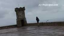 016213 Eve Takes A Pee On The Battlements Of Castello Montjuic