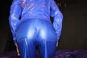 Watching Sandra in sexy blue shiny nylon raver pants and a jacket lolling and posing in front of a mirror (Pics)