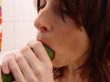 Sucking and fucking a cucumber