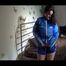 Jill enjoyng herself wearing sexy shiny nylon shorts and rain jacket (Video)