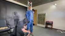 Ms ungeniert tied, gagged, suspended ind a shiny nylon Rainsuit and finally bullwhipped