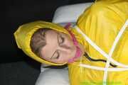 Get Pictures of Pia bound and gagged in her yellow shiny nylon Rainwear