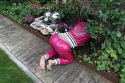 Watching Aiyana wearing supersexy pink shiny nylon rainwear while planting flowers in the garden (Pics)