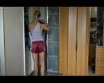 Sexy Sandra examine the cupboard with shiny nylon shorts and posing in shiny nylon shorts and a top (Video)