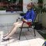 Sexy Mara being tied and gagged on a chair outdoor wearing a sexy shiny nylon shorts and a rain jacket (Pics)