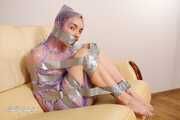 Leda - Ball taped in raincoat