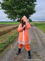 Miss Amira in AGU Adidas rain suit and transparent rain gear