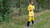 Miss Petra goes for a walk in friesennerz, yellow rain dungarees and rubber boots