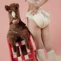 I am rocking my rocking horse in my diaper