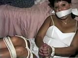 33 YEAR OLD AMERICAN INDIAN TRISH IS BALL GAGGED, MOUTH STUFFED, OTM  GAGGED, BAREFOOT, & TIED UP TIGHT WITH ROPE (D64-14)