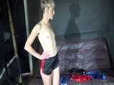Watch Sonja changing and trieing some of her shiny nylon Shorts 