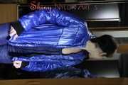 Watching sexy Destiny wearing a sexy blue shiny nlon downbib and a shiny nylon blue down jacket lingering around in the garden (Pics)
