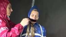 SEXY SANDRA being tied and gagged with ropes and a clothgag from Stella  both wearing sexy shiny nylon AGU rainwear (Video)