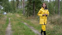 Miss Petra goes for a walk in friesennerz, yellow rain dungarees and rubber boots