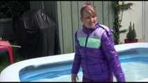 Watching Mara wearing a supersexy purple down skirt and a purple down jacket cleaning the swimming pool and playing with water (Video)