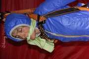 Sexy Sonja being tied and gagged with ropes and a clothgag hanging wearing a sexy rainwear combination (Pics)