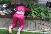 Watching Aiyana wearing supersexy pink shiny nylon rainwear while planting flowers in the garden (Pics)