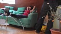 Lisa roped on couch 1/2