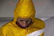 Watching Pia being tied and gagged with tape and a cloth gag wearing sexy yellow shiny nylon rainwear (Pics)