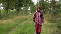 Miss Petra takes a walk in an AGU rain suit and rubber boots