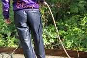 Watching sexy Sandra watering the flowers in the garden and lolling in the sun wearing a sexy blue shiny nylon rain pant and a purple down jacket (Pics)