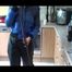 Jill wearing a super thin black rain pants and a black/blue down jacket while cleaning the kitchen (Video)