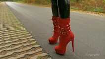 Black gloss leggings and red boots