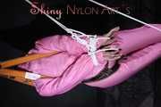 Sexy SANDRA wearing a hot pink oldschool downbib and a down jacket being tied and gagged with ropes and a clothgag hanging on the ceiling  Part 1 of 2 (Pics)