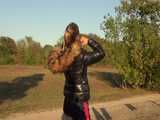 Watch Sandra enjoying her shiny nylon Downjacket at very warm Wearther outside