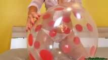 red fingernail popping of seven balloons