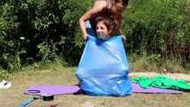 Dana & Ketrin  - Ketrin ball taped and packed in trashbag by Dana (video)