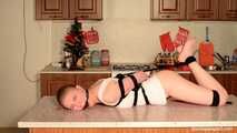 Angela - tied up on a kitchen table