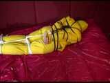Get 2 Videos with Lucy bound and gagged enjoying her shiny nylon Rainwear from our 2021 Archive