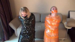 Sasha Swift & Christina Clark - Girls are captured, cuffed, gagged, and wrapped to chairs (video)