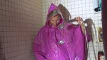 Watching Sandra wearing only a pink shiny nylon raincape under the shower playing with the water (Video)