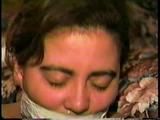 24 YR OLD LATINA HOUSEWIFE MOUTH STUFFED, WRAP TAPE GAGGED, BAREFOOT & TOE TIED (D61-11)