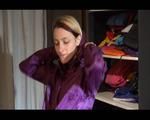 Sonja wearing a sexy purple shiny nylon rainwear combination during reordering the cupboard (Video)