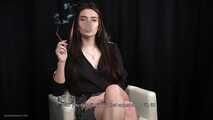 Alla is giving an interview while smoking her favorite cigarettes