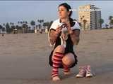 033005 Renee Takes A Daring Pee On Muscle Beach