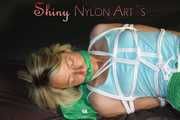 PART TWO - SEXY SONJA being tied and gagged with ropes and a clothgag wearing a sexy green shiny nylon shorts and a blue shirt (Pics)
