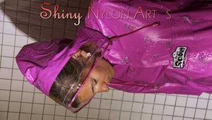 Watching Sandra wearing only a pink shiny nylon raincape under the shower playing with the water (Pics)